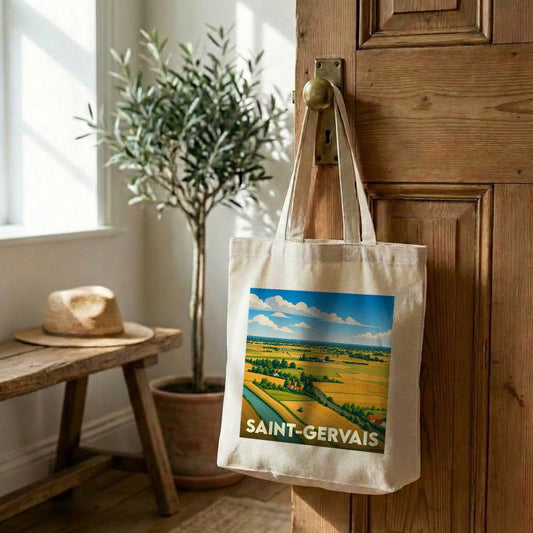 Tote bag souvenir de la ville de Saint-Gervais avec une illustration de paysage champêtre.