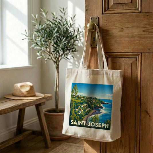 Tote bag souvenir de la ville de Saint-Joseph avec une illustration paysagère stylisée.