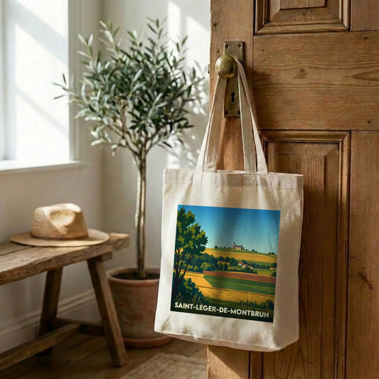Tote bag souvenir de la ville de Saint-Léger-de-Montbrun avec une illustration de paysage champêtre.