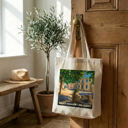 Tote bag souvenir de la ville de Saint-Mamert-du-Gard illustré par un paysage ensoleillé.