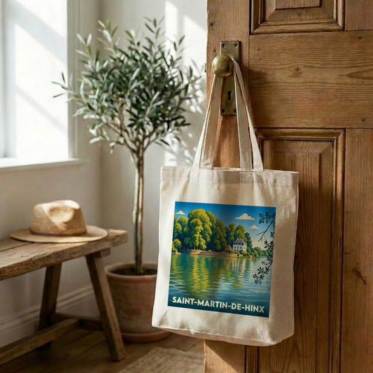 Tote bag souvenir de la ville de Saint-Martin-de-Hinx avec une illustration paysagère stylisée.