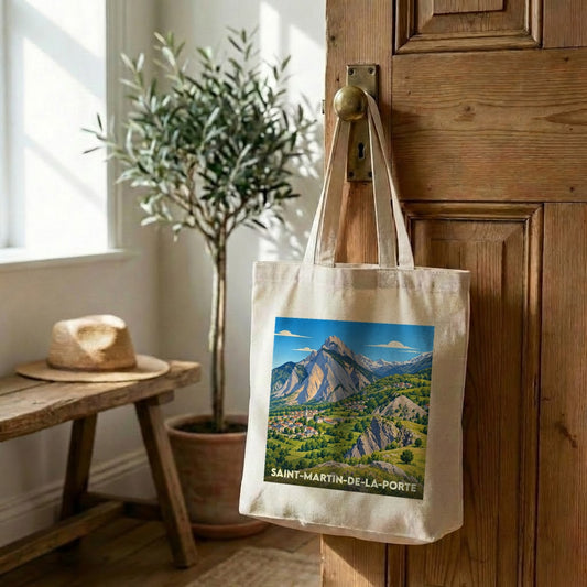 Tote bag souvenir de la ville de Saint-Martin-de-la-Porte avec une illustration de paysage montagneux.