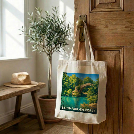 Tote bag souvenir de la ville de Saint-Paul-en-Forêt illustré d'un paysage de pont et de forêt.