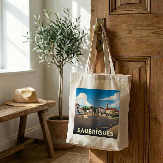 Tote bag souvenir de la ville de Saubrigues avec une illustration stylisée.