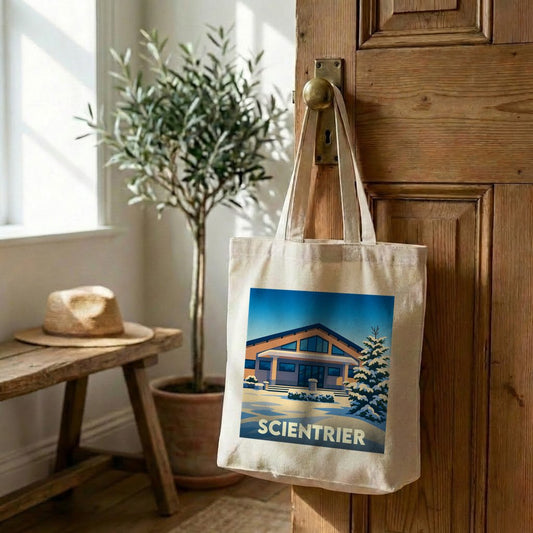 Tote bag souvenir de la ville de Scientrier avec une illustration stylisée d'un paysage hivernal.