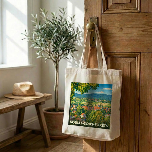 Tote bag souvenir de la ville de Soultz-sous-Forêts avec une illustration stylisée de son paysage rural.