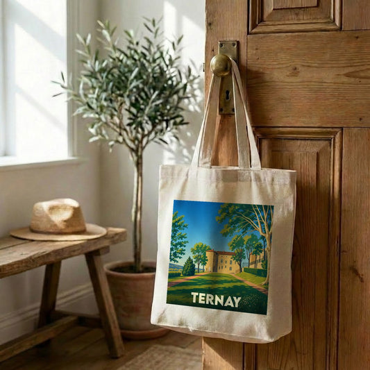 Tote bag souvenir de la ville de Ternay avec une illustration stylisée d'un château entouré de verdure.