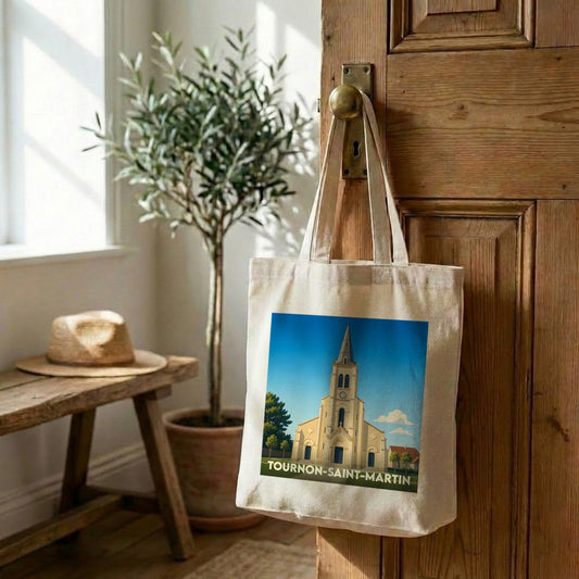 Tote bag souvenir de la ville de Tournon-Saint-Martin avec une illustration stylisée de son église.