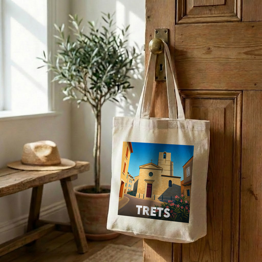 Tote bag souvenir de la ville de Trets avec une illustration stylisée de son église provençale.